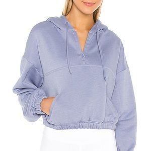 Alo Stadium Quarter-Zip Hooded Sweatshirt in blue moon